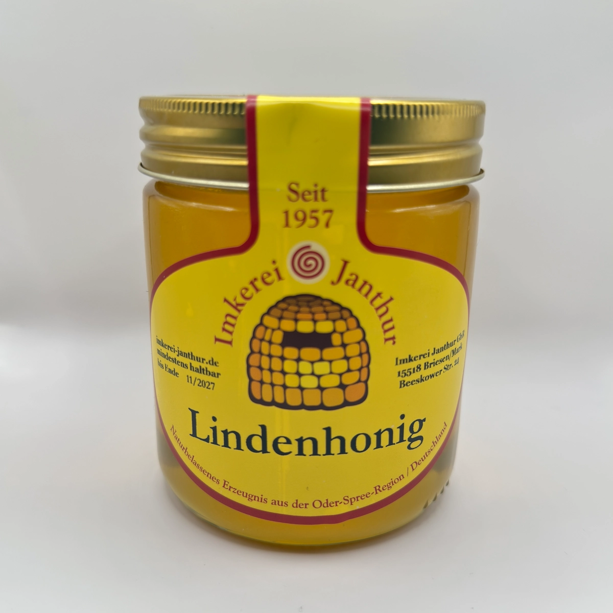Glas Lindenhonig der Imkerei Janthur, frontal fotografiert vor weißem Hintergrund