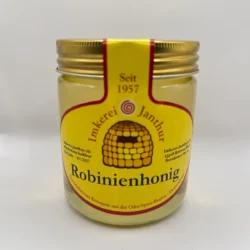 Glas Robinienhonig der Imkerei Janthur, klarer Honig vor weißem Hintergrund